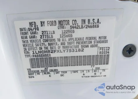 1990 Lincoln Town Car Signature z USA, uszkodzony, nr VIN 1LNCM82FXLY753182